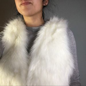 White faux fur vest
